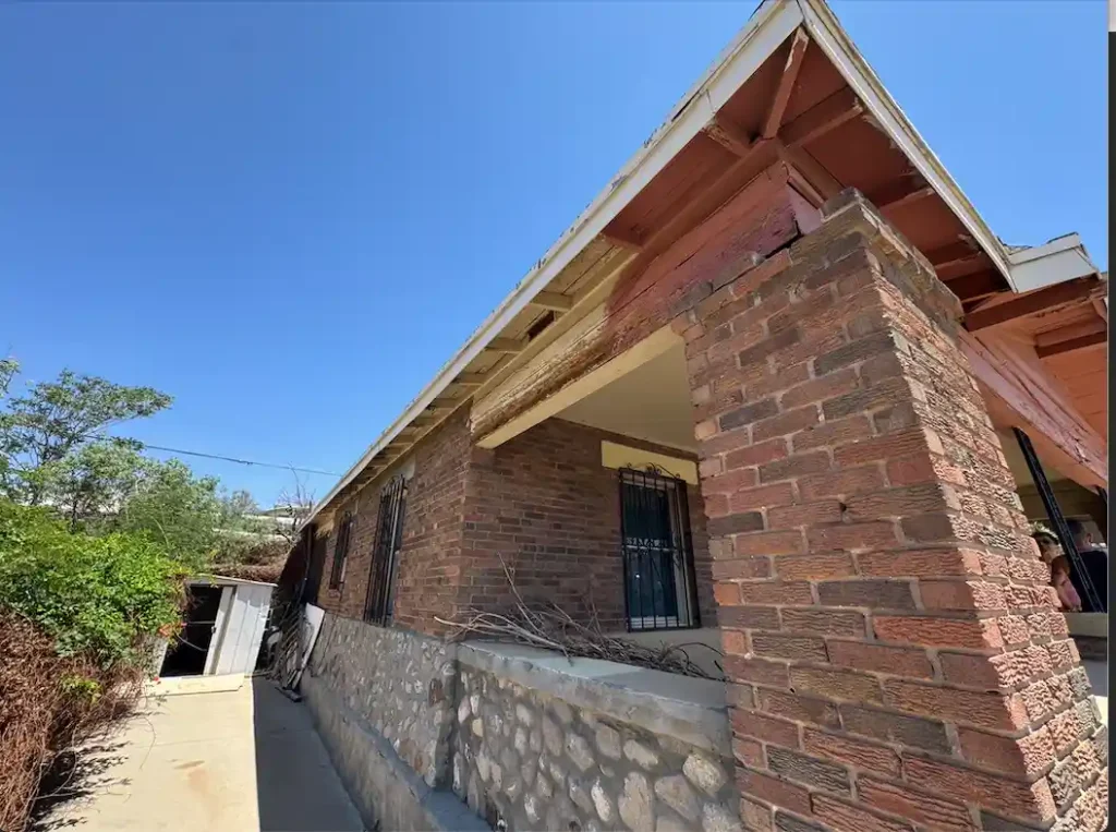 Front of inherited house in El Paso at 2705 Portland, recently sold after title issues were resolved by We Buy Casa