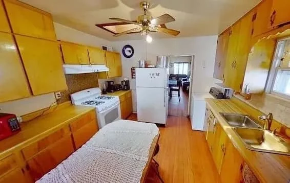Before renovation: El Paso home purchased by We Buy Casa showing original kitchen and dated finishes prior to repairs